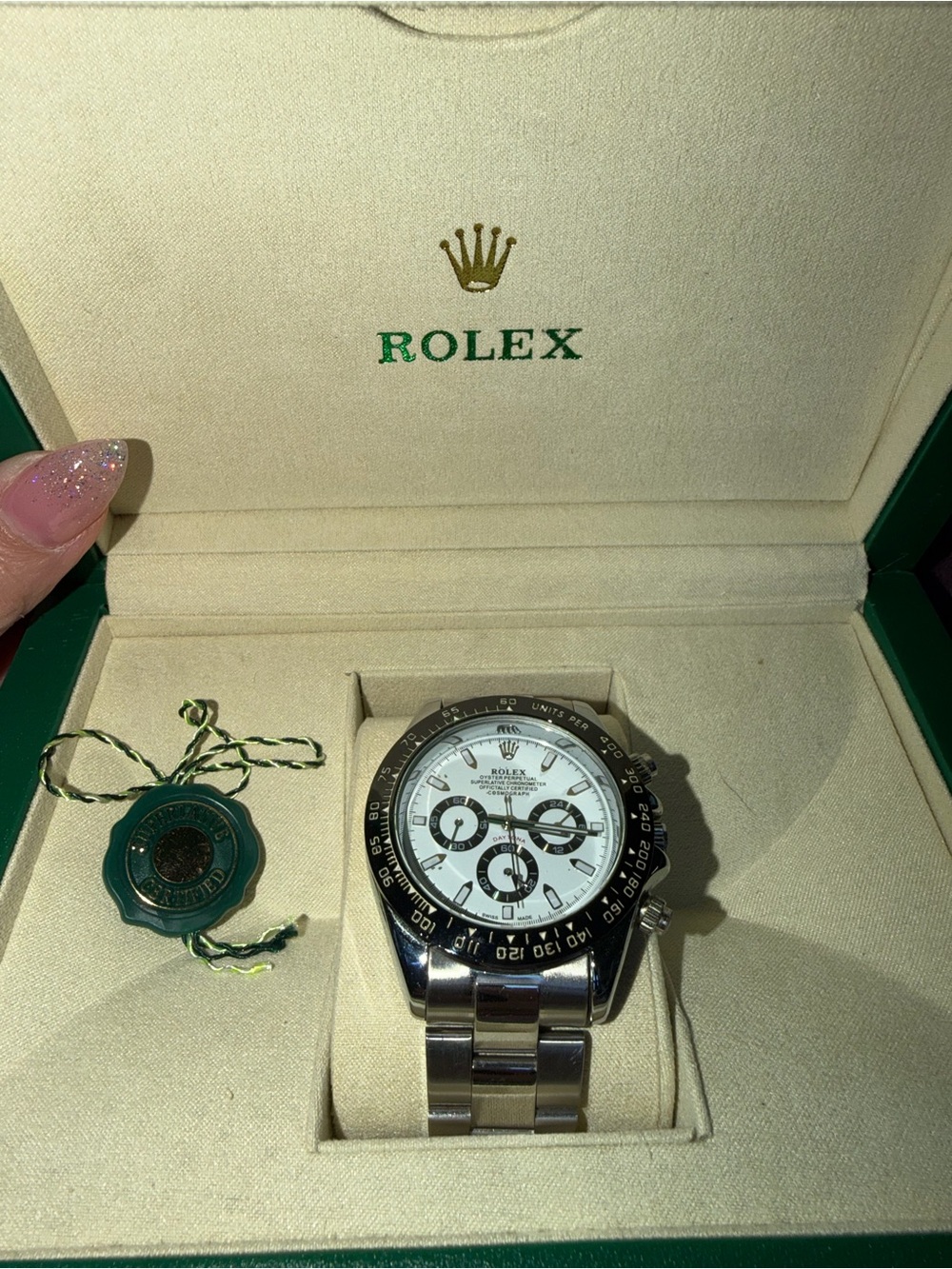 Rolex Men’s Stainless Steel Watch with White Dial and Black Bezel